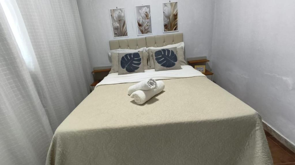 Postel nebo postele na pokoji v ubytování Quarto 1 próximo ao Aeroporto Internacional