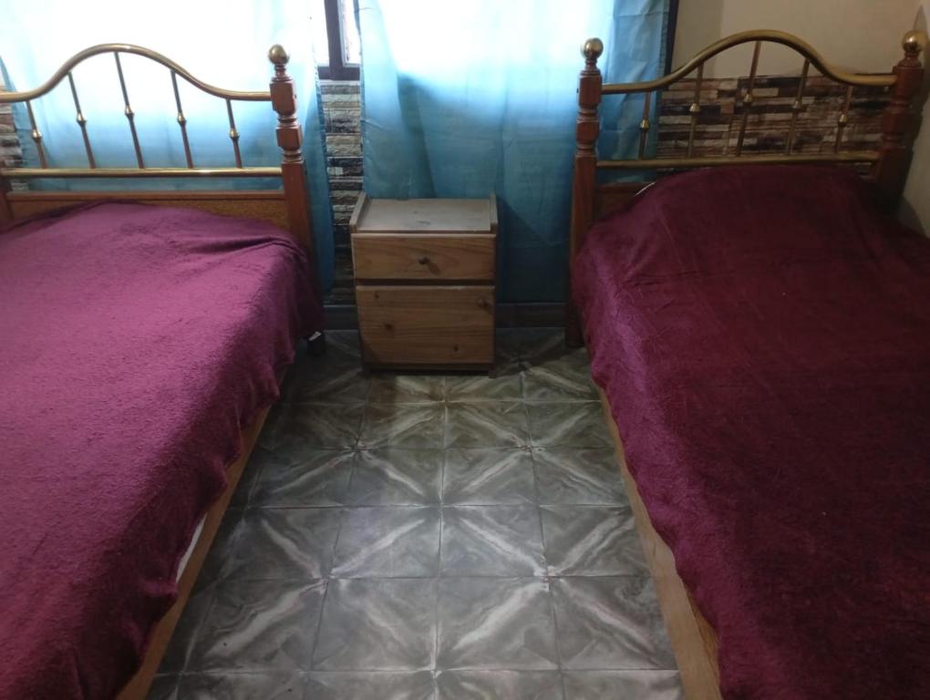 Postel nebo postele na pokoji v ubytování La Casita de Romeo