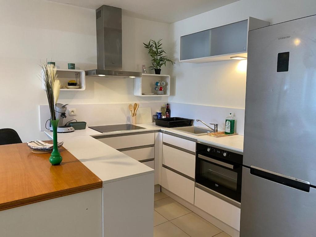 Kuchyň nebo kuchyňský kout v ubytování Small cocoon in city center