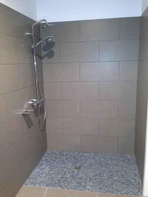 A bathroom at Hotel Can Ribalta