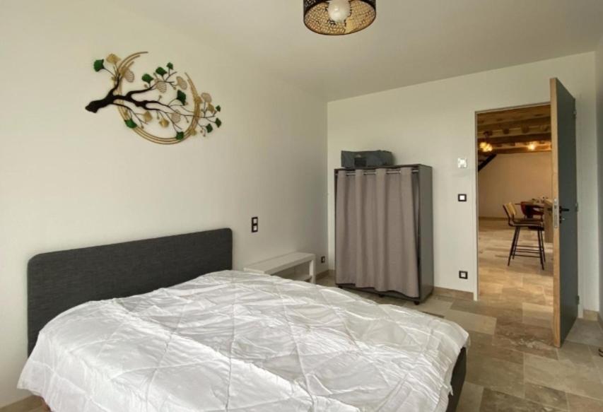 Postel nebo postele na pokoji v ubytování Gîte de Blavette