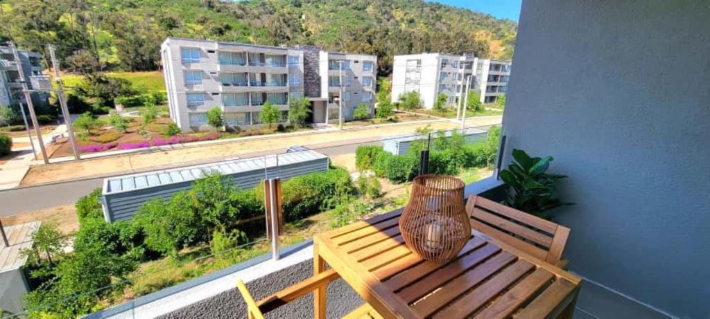 En balkon eller terrasse på Rbk° Depto nuevo en condominio en Papudo