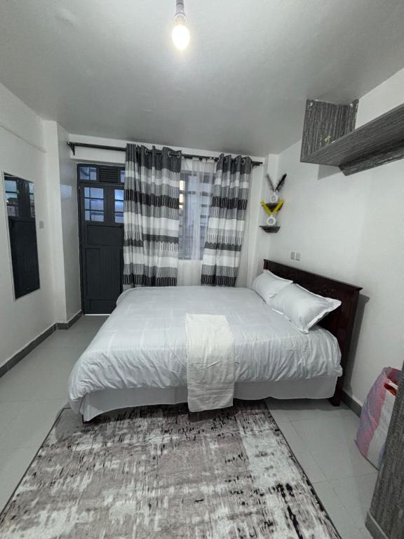 Krevet ili kreveti u jedinici u okviru objekta Lavish Apartment