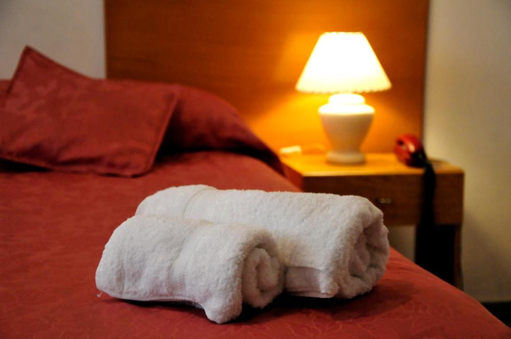 Ένα ή περισσότερα κρεβάτια σε δωμάτιο στο Hotel Almería San Rafael