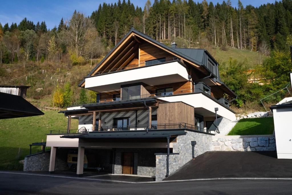 a house on the side of a mountain at Nestzeit in Eben im Pongau