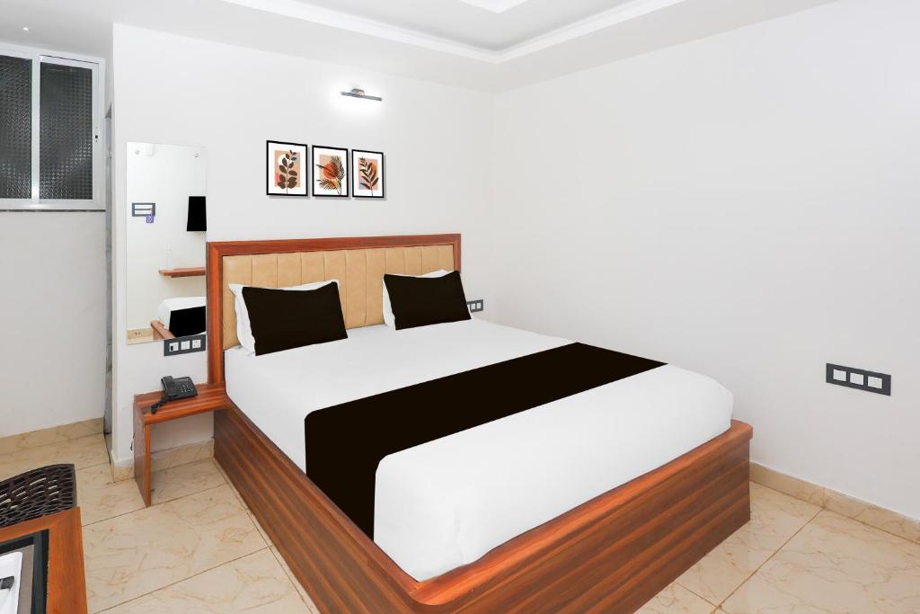 Ένα ή περισσότερα κρεβάτια σε δωμάτιο στο Super Hotel O Deluxe