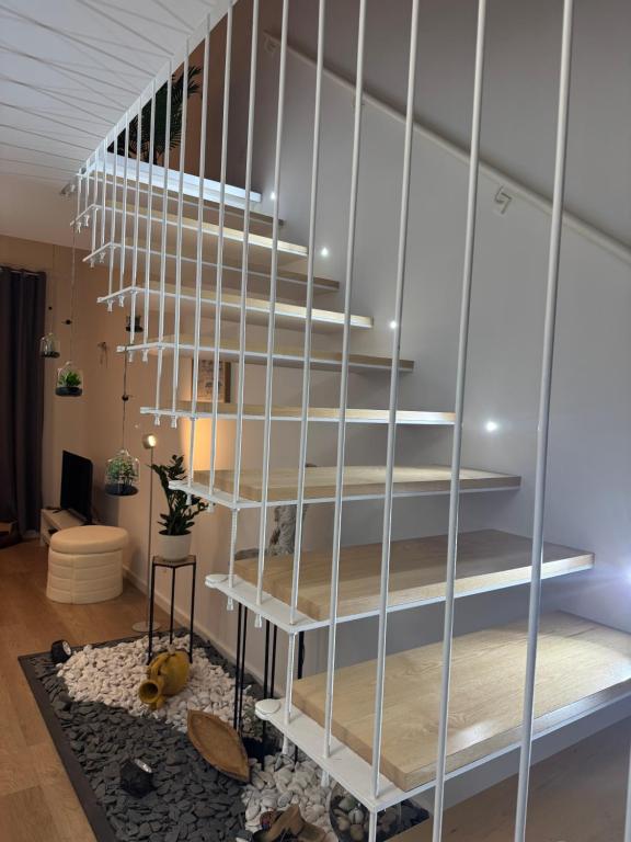 Ένα ή περισσότερα κρεβάτια σε δωμάτιο στο CreaConfort Casa Boa Jóia de Campanhã