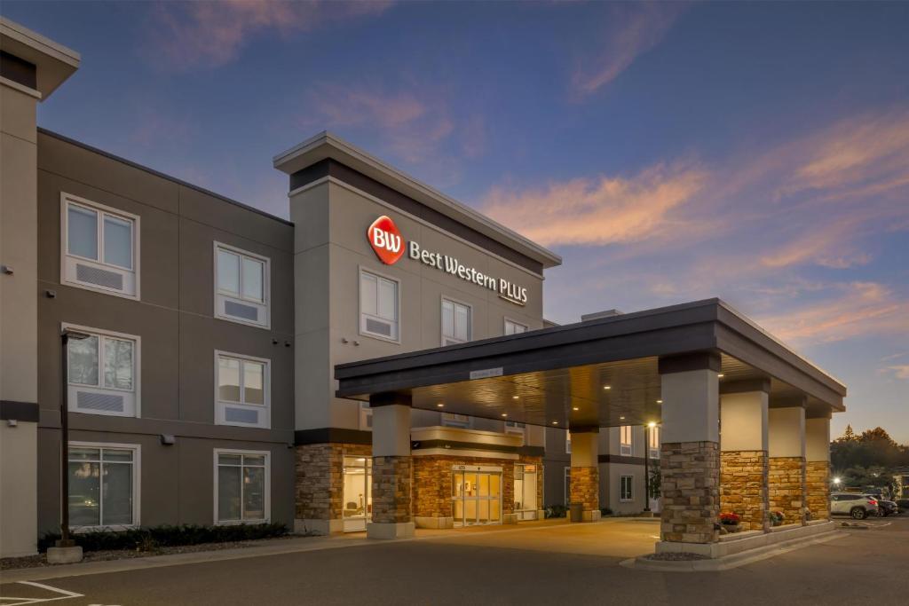 a rendering of the front of a hotel building at Best Western Plus Isanti in Isanti