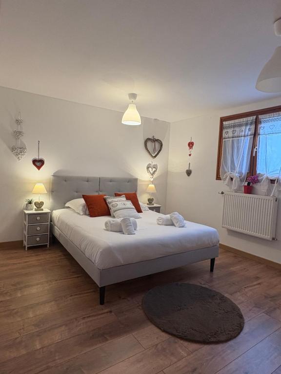 Ένα ή περισσότερα κρεβάτια σε δωμάτιο στο Gîte au cœur du vignoble