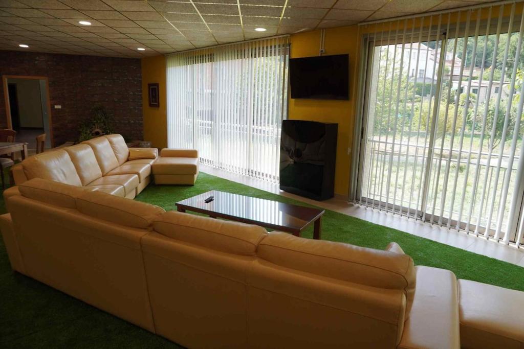 Χώρος καθιστικού στο Hospedaje Casa Ribeira Sacra