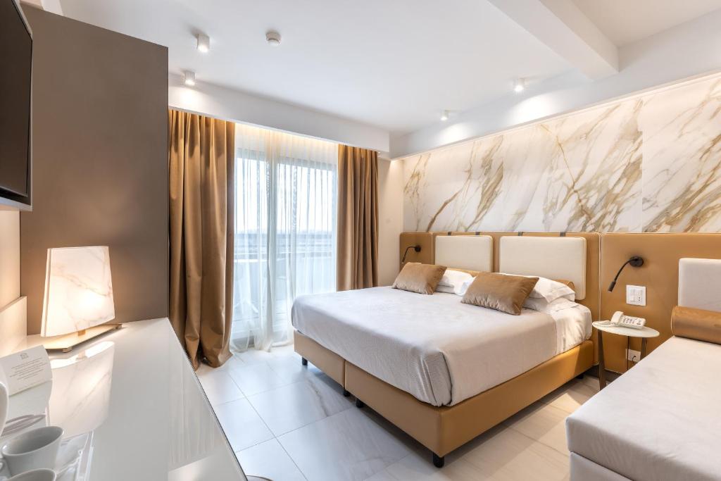 Postel nebo postele na pokoji v ubytování Hotel Feldberg