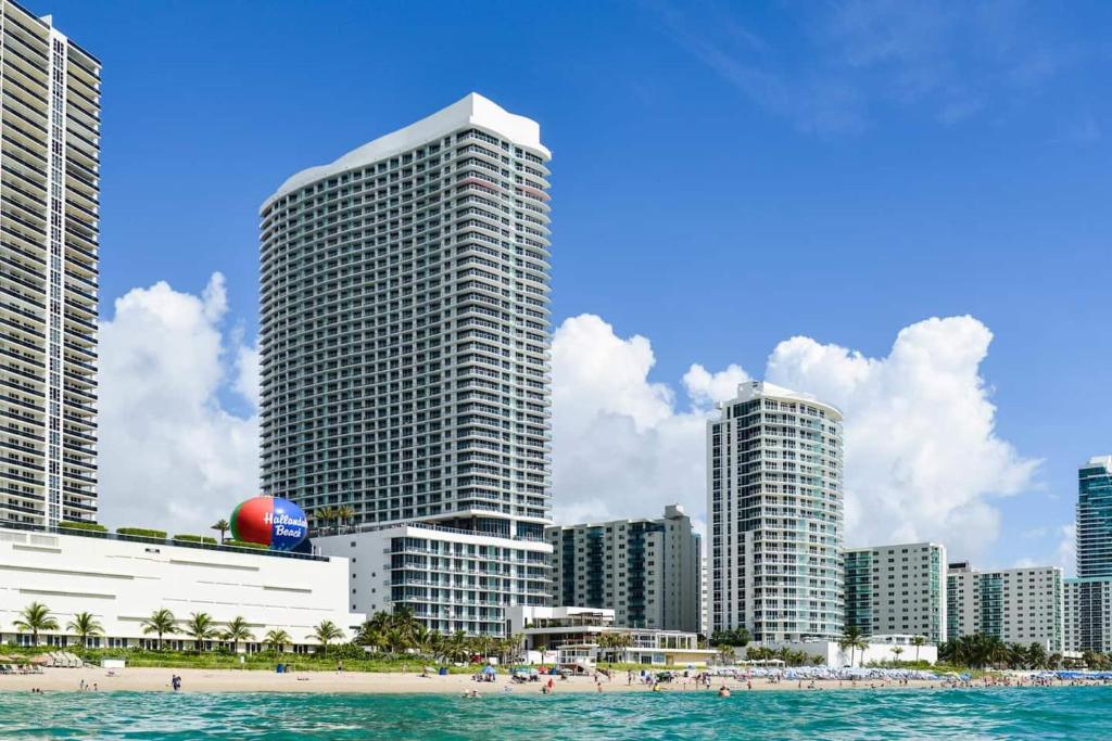 a view of a city with tall buildings and a beach at Oceanfront Lyfe Resort in Hollywood