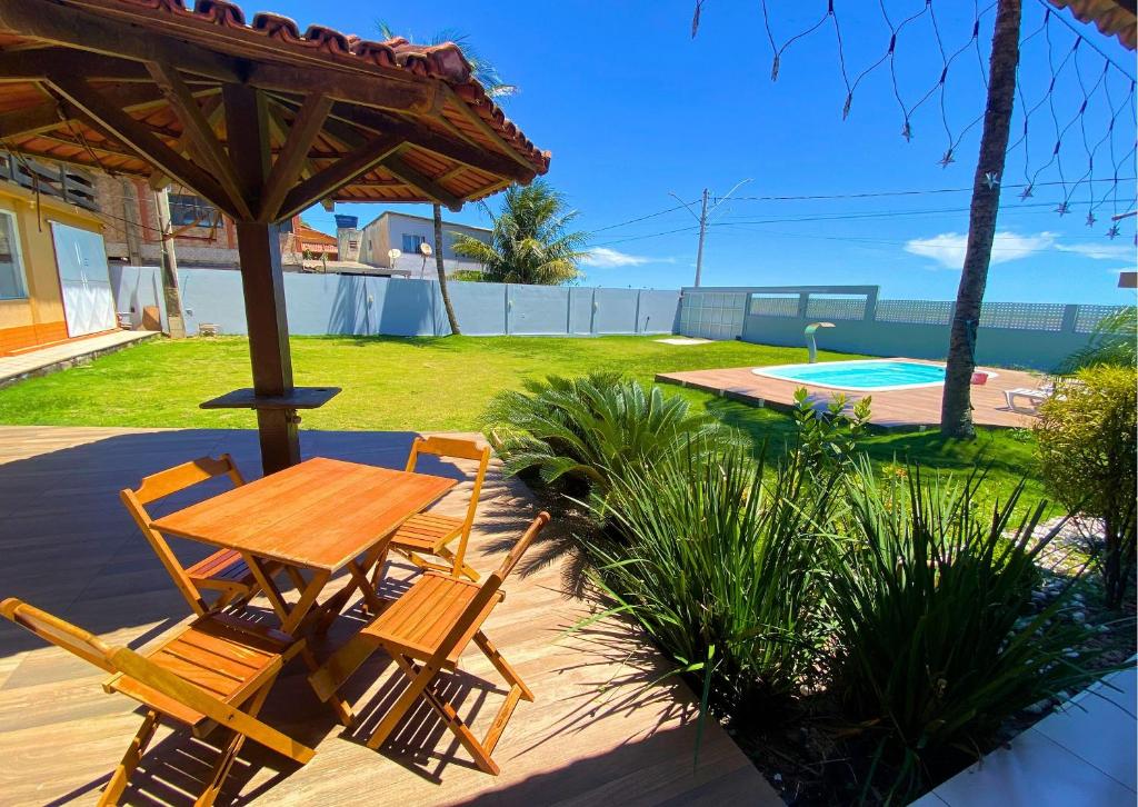 Bazén v ubytování Casa Vista do Sol, 5min de carro de Castelhanos, Frente Mar de Anchieta, 5 quartos-2 com ar condicionado lazer completo nebo v jeho okolí