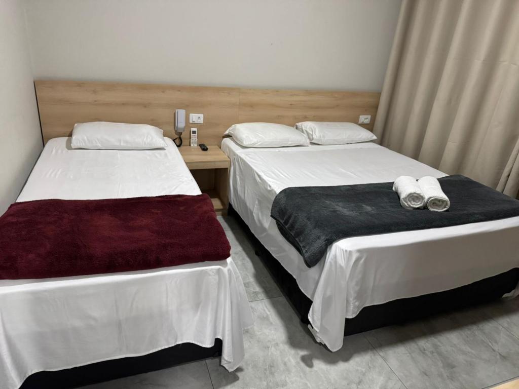 Postel nebo postele na pokoji v ubytování Hotel Novo México