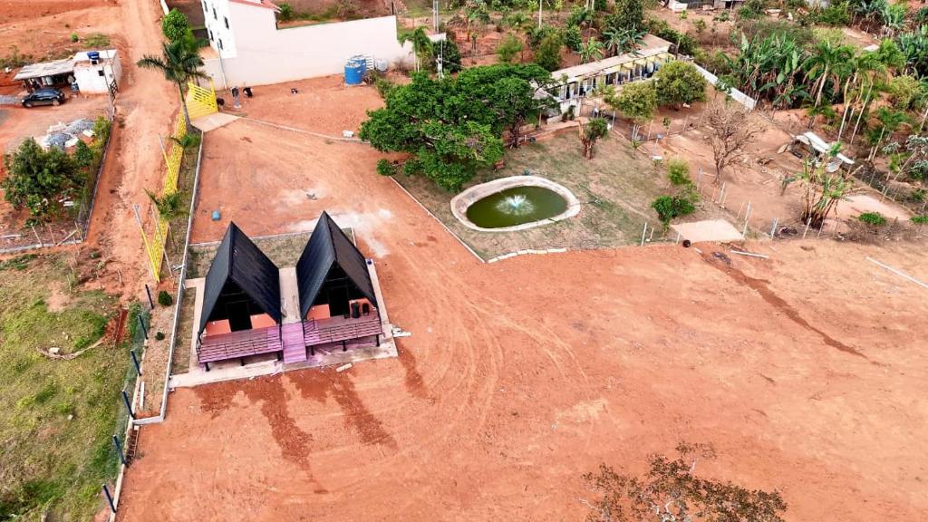an aerial view of a house with a tent at Chalés JH in São Roque de Minas