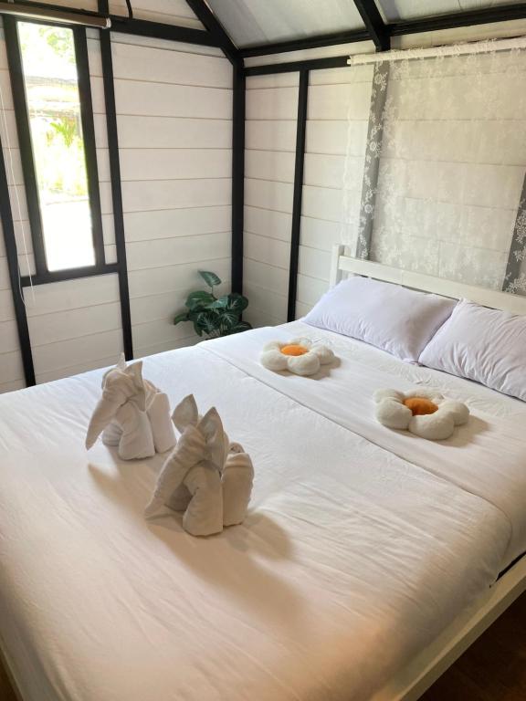 Ένα ή περισσότερα κρεβάτια σε δωμάτιο στο Lantamangrove