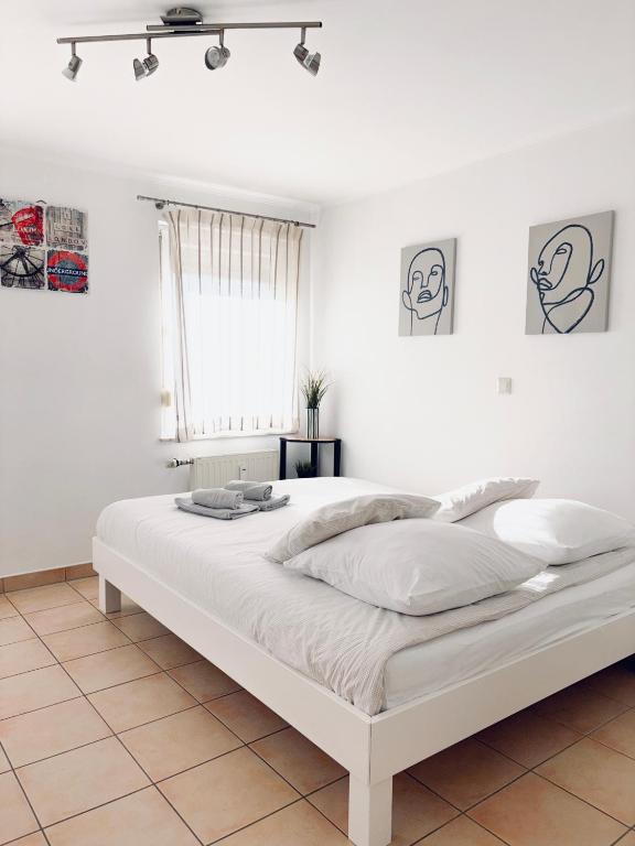 Llit o llits en una habitació de Apartment 72 Ettelbrück