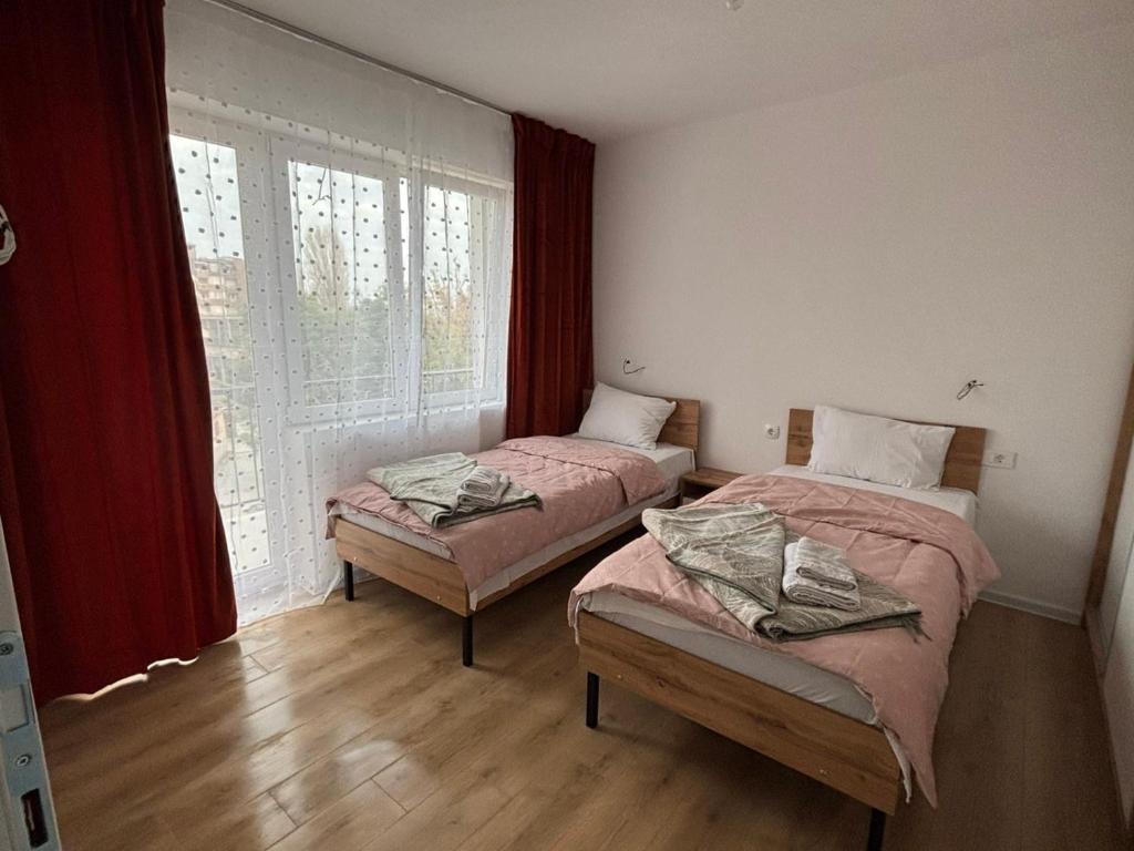 Postel nebo postele na pokoji v ubytování TESLA 132 Apartment 9