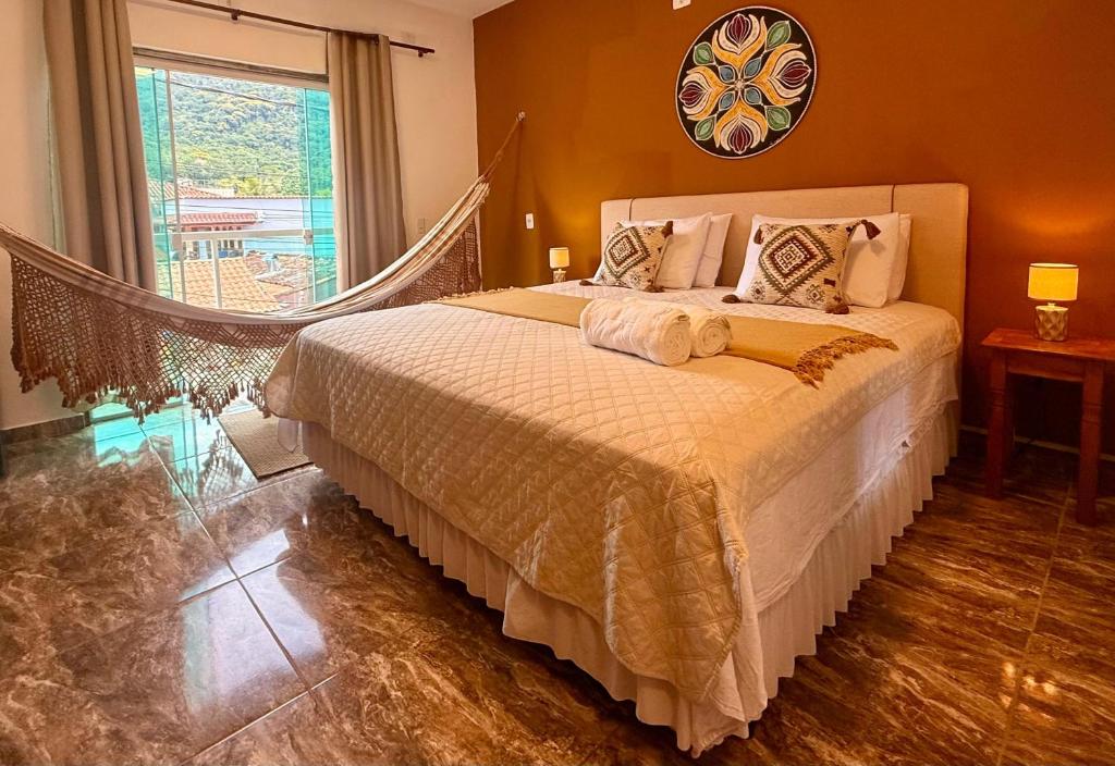 Ένα ή περισσότερα κρεβάτια σε δωμάτιο στο Mandala Suites