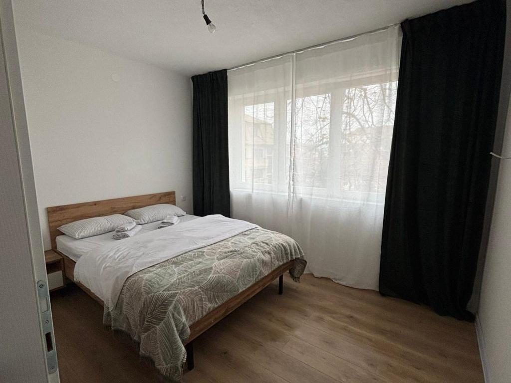 Postel nebo postele na pokoji v ubytování TESLA 132 Apartment 9