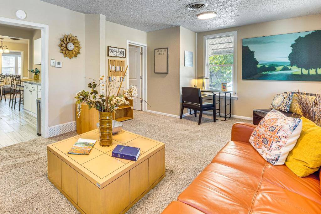 a living room with a couch and a table at Pueblo Perfection A Quiet Colorado Adventure! in Pueblo
