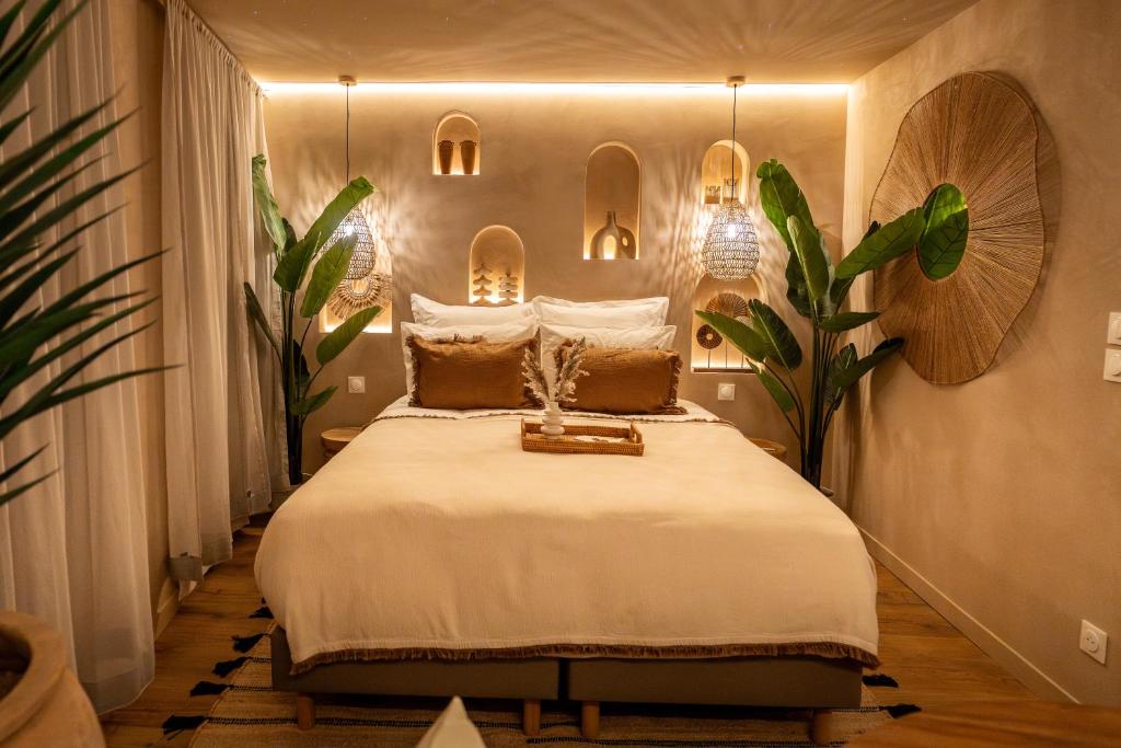 Ένα ή περισσότερα κρεβάτια σε δωμάτιο στο Cenote Suite - Expérience sensorielle