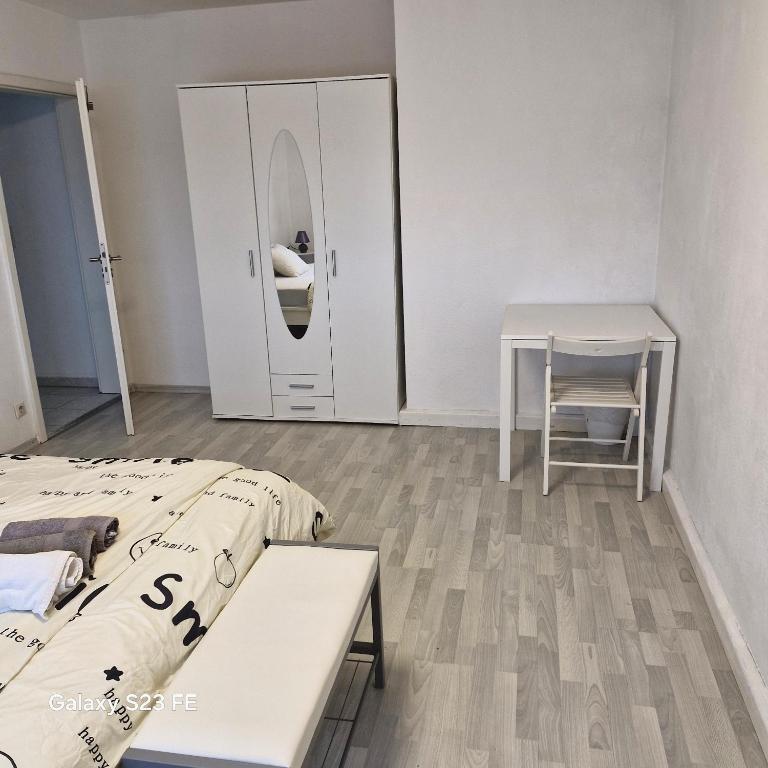 Ένα ή περισσότερα κρεβάτια σε δωμάτιο στο Esquina