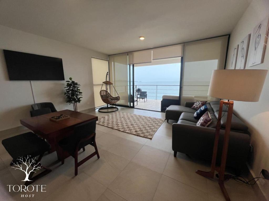 Posezení v ubytování Condominio Frente al Mar