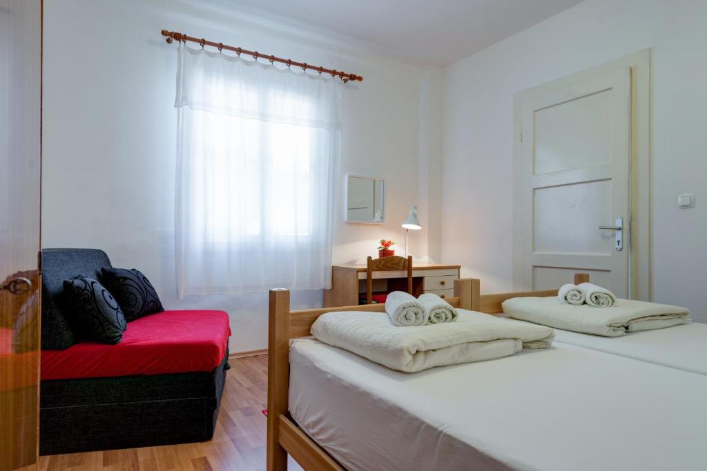 Postel nebo postele na pokoji v ubytování Apartments Odrina