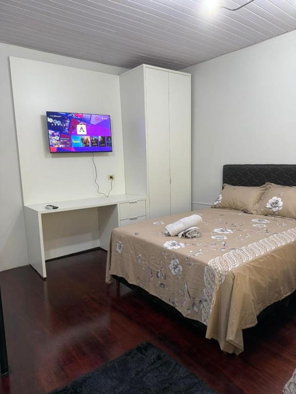 Ένα ή περισσότερα κρεβάτια σε δωμάτιο στο Studio Loft San Isidro