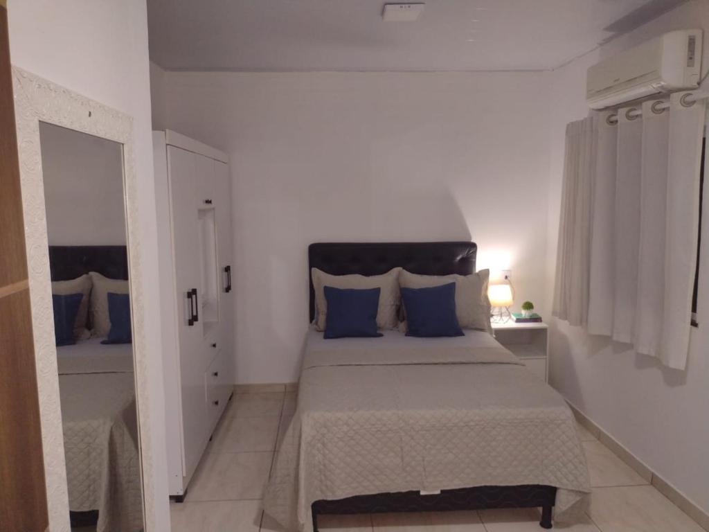 Postel nebo postele na pokoji v ubytování Residência dos Valentes