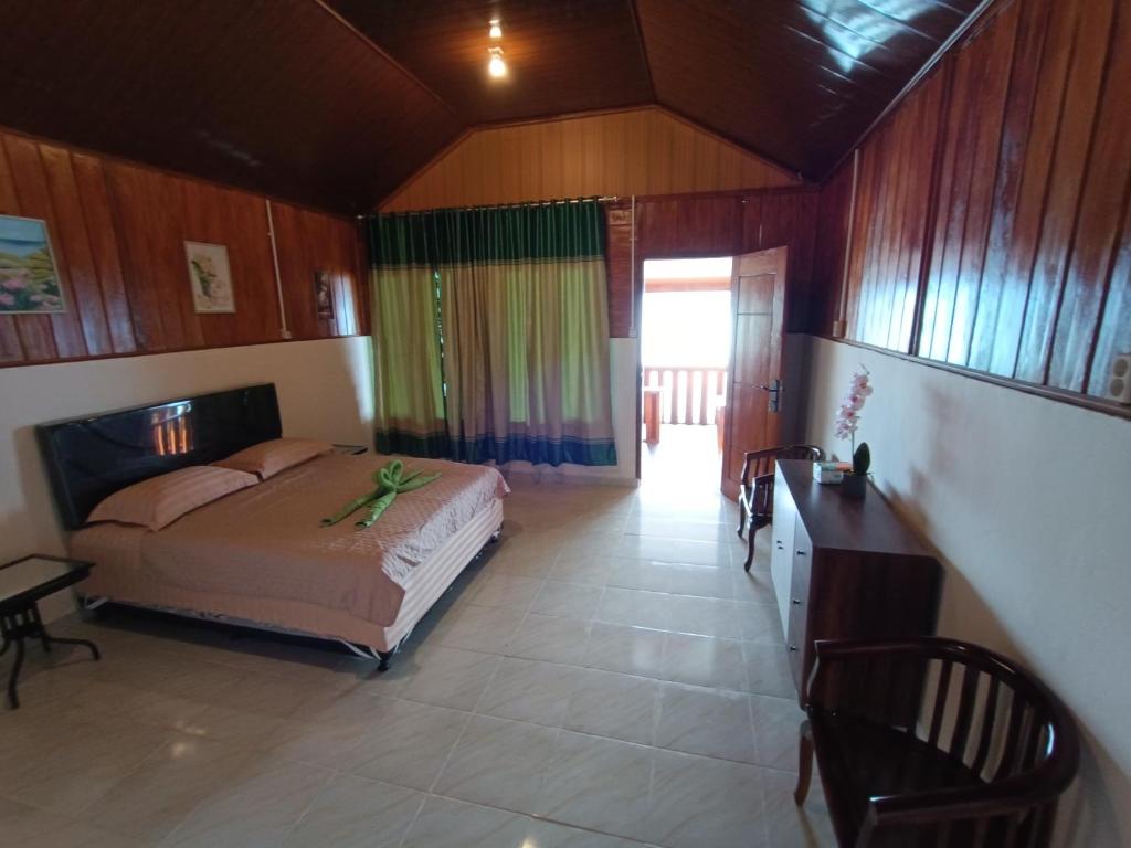 Ένα ή περισσότερα κρεβάτια σε δωμάτιο στο SeaGarden Guesthouse