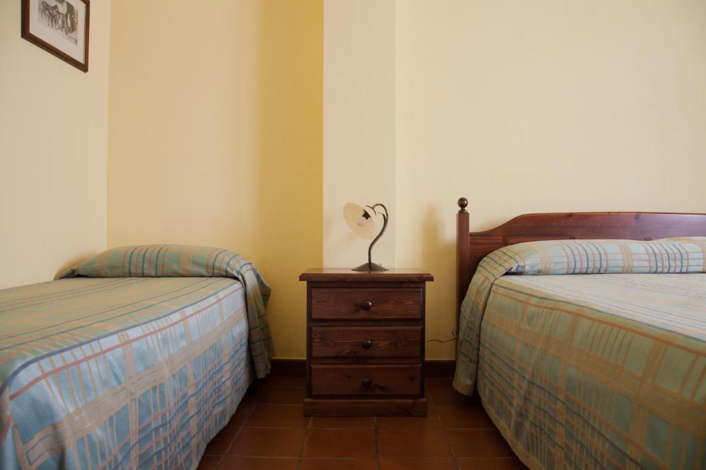 Postel nebo postele na pokoji v ubytování L'Antica Vigna