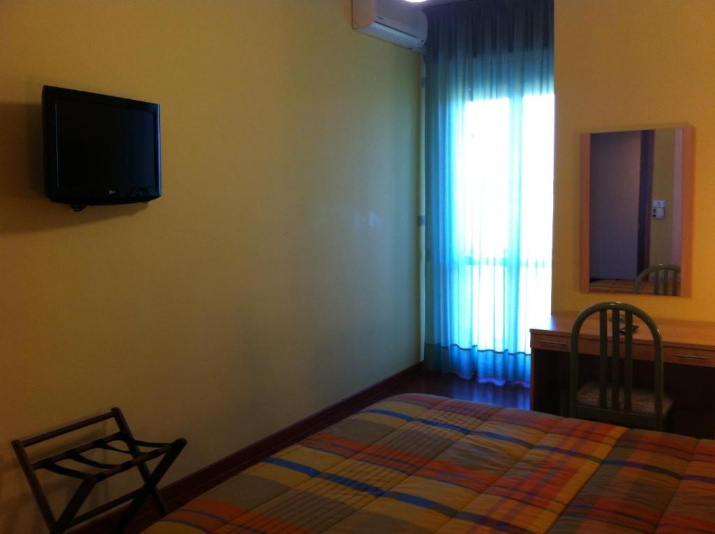 TV a/nebo společenská místnost v ubytování Hotel Atleti