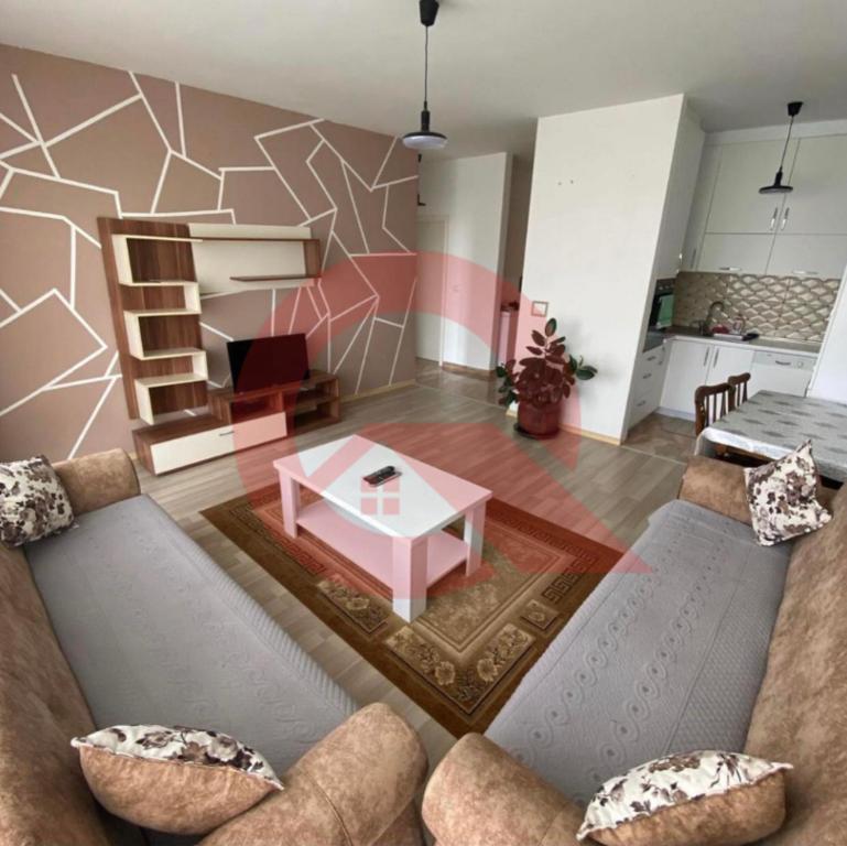 Χώρος καθιστικού στο Cozzy Apartment