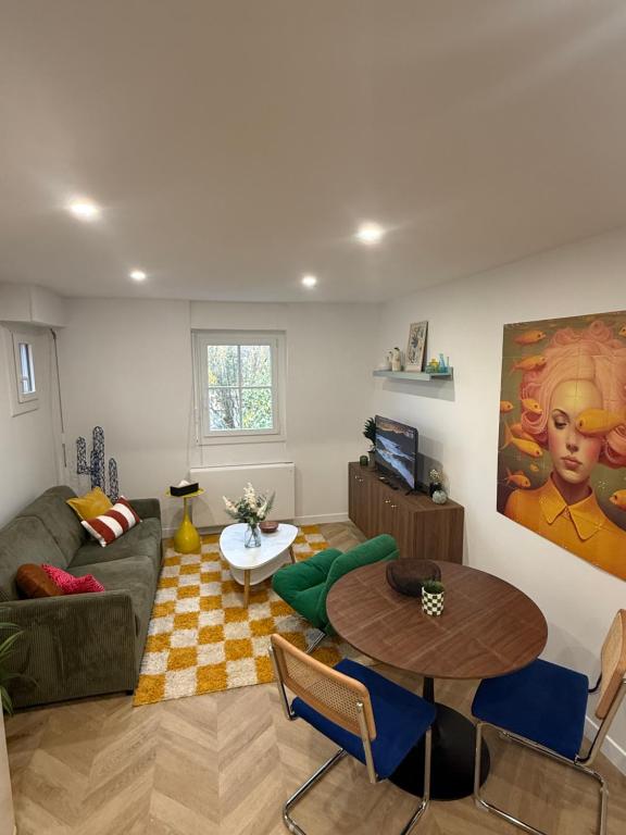 Et opholdsområde på Suite cozy pour pros et séjours confort