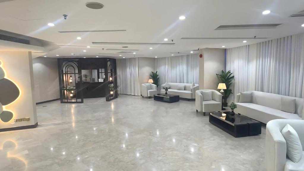 Svetainės erdvė apgyvendinimo įstaigoje Bloom Hotel-Kuwait