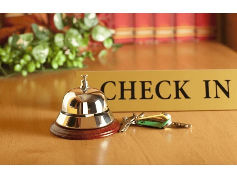 a close up of a check in bell on a table at Nangli Homestay in Meerut
