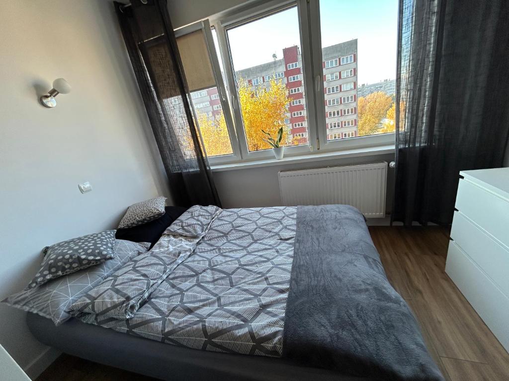 Postel nebo postele na pokoji v ubytování Sunny