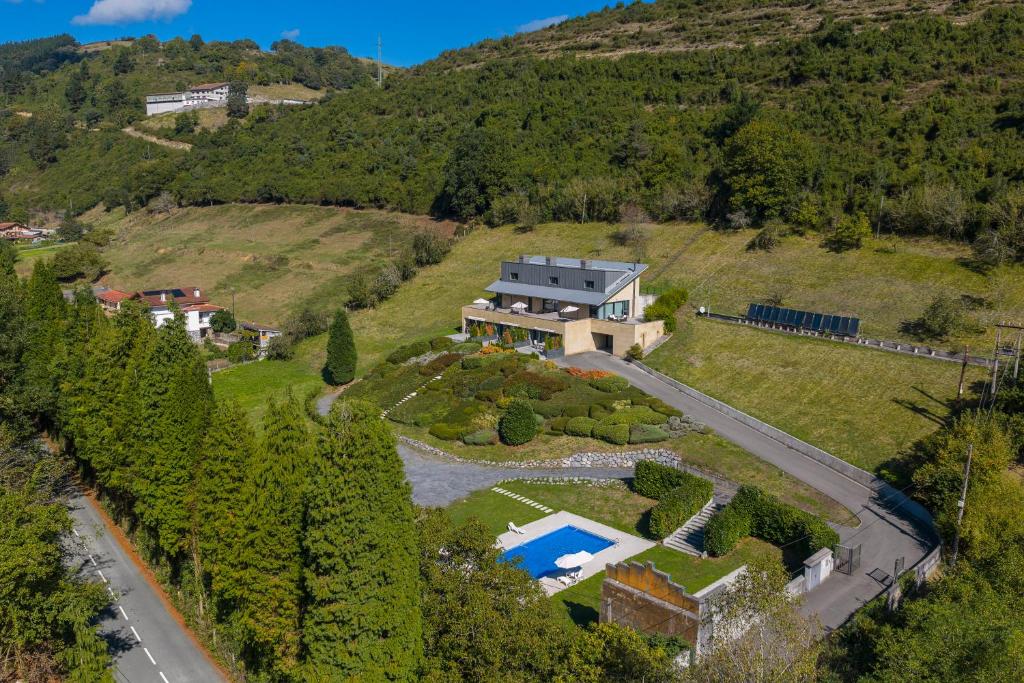 an aerial view of a house on a hill at Beautiful house 15 min away from Bilbao in Llodio
