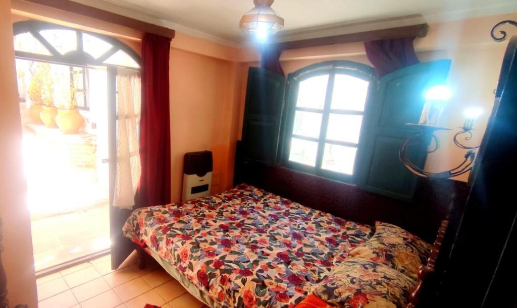 Ένα ή περισσότερα κρεβάτια σε δωμάτιο στο Casa Maria Victoria