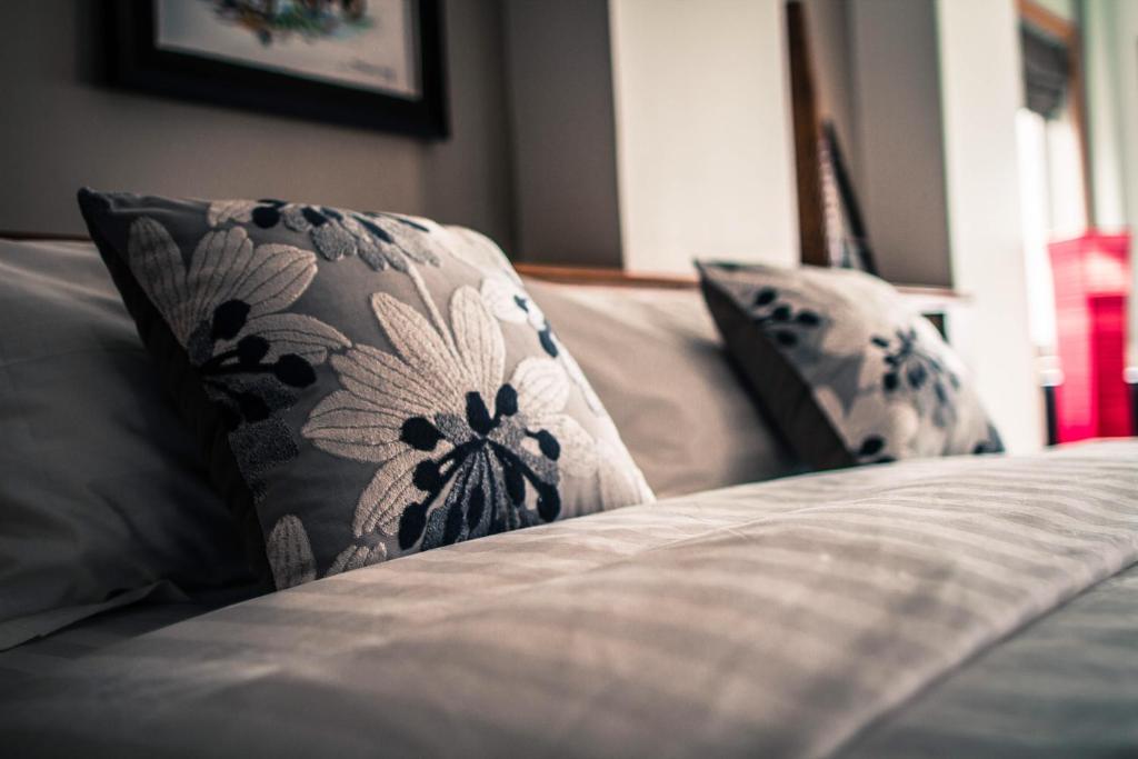 Postel nebo postele na pokoji v ubytování Point Boutique Hotel
