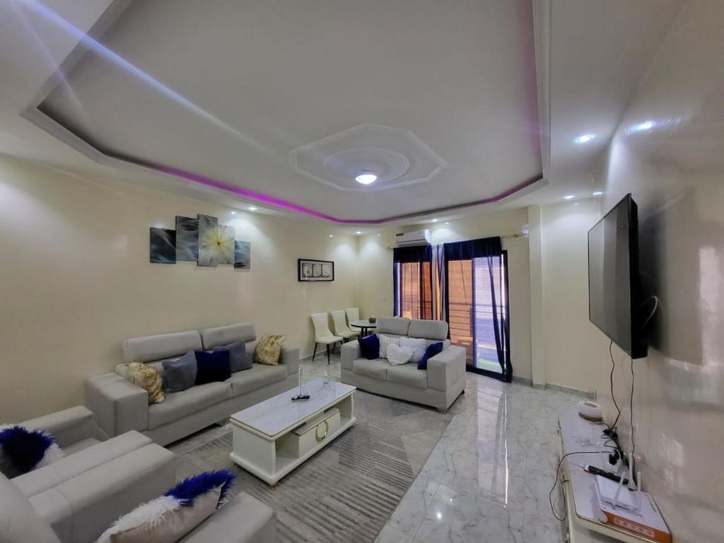 TV a/nebo společenská místnost v ubytování Sweet Escape