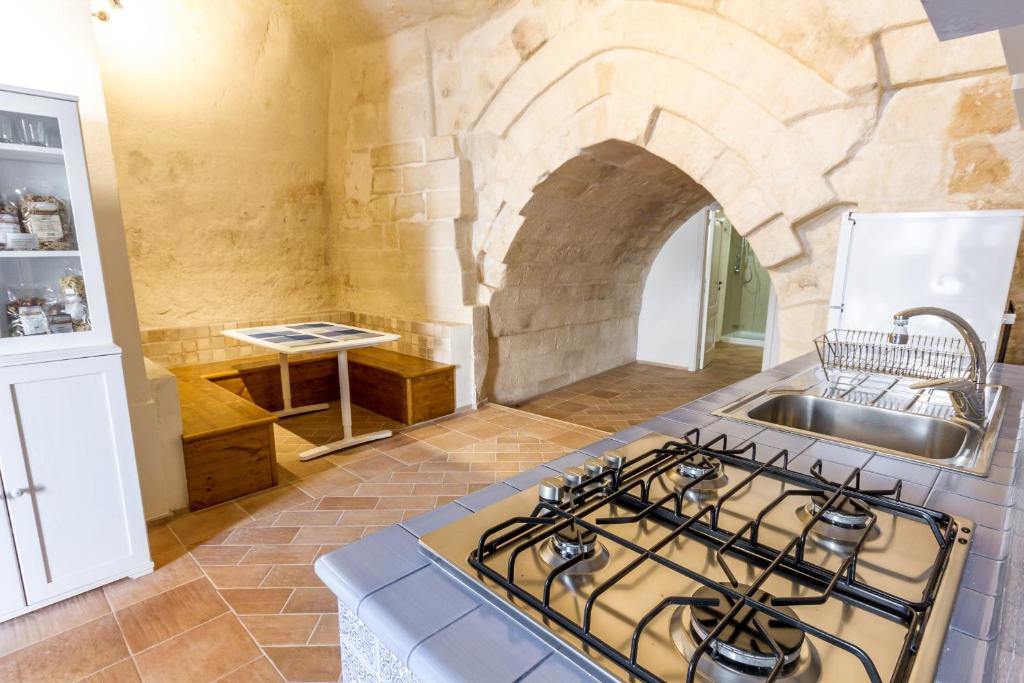 Kuchyň nebo kuchyňský kout v ubytování Casamata Matera