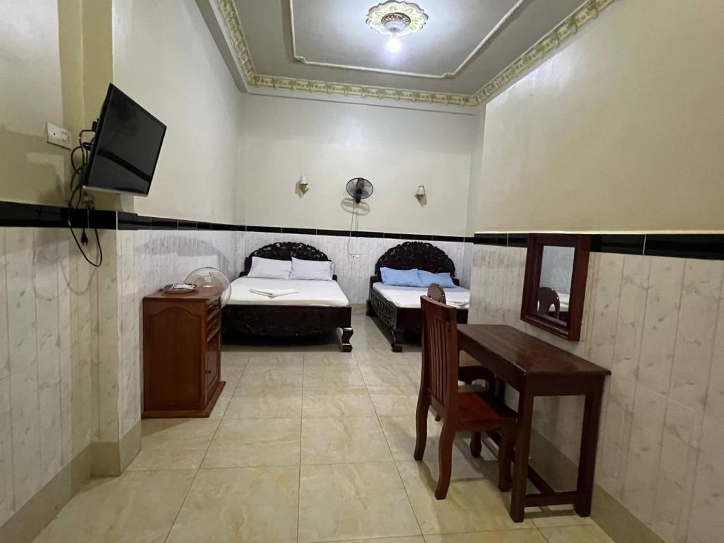 Postel nebo postele na pokoji v ubytování Mohaleap Shanghai Guest House