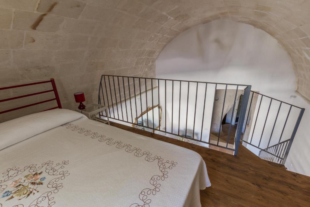 Postel nebo postele na pokoji v ubytování Casamata Matera