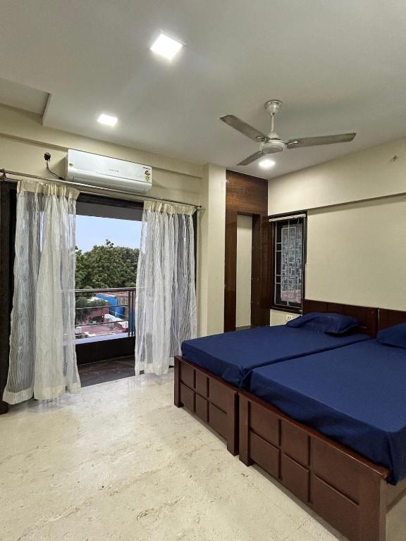 Ένα ή περισσότερα κρεβάτια σε δωμάτιο στο Stayo by Hubu