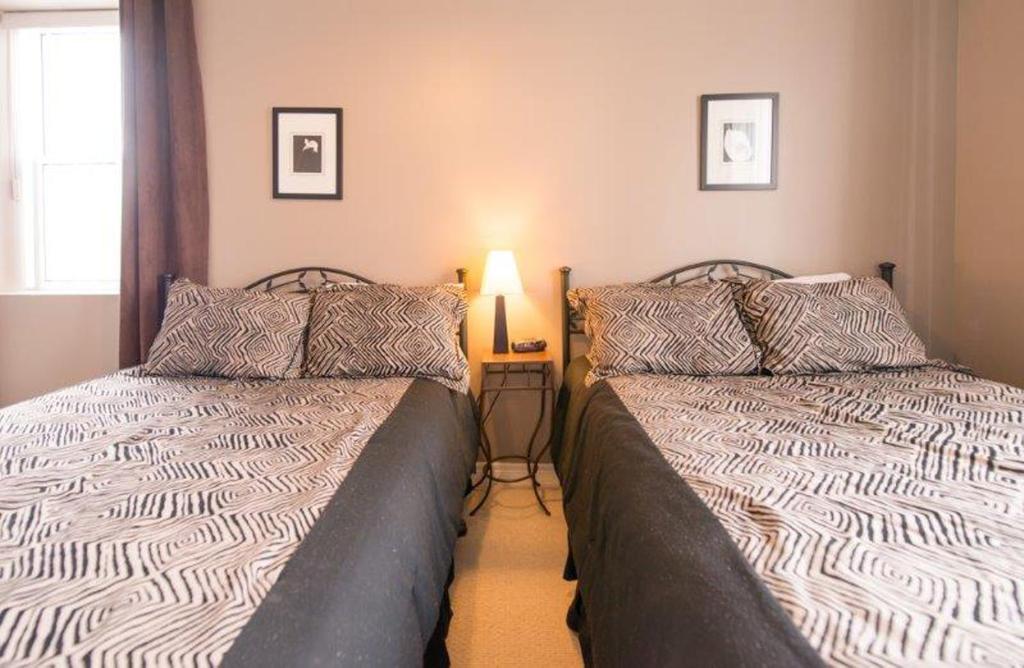 Postel nebo postele na pokoji v ubytování Presidential Suite