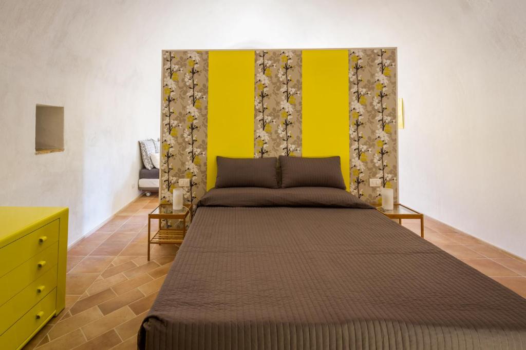 Postel nebo postele na pokoji v ubytování Casamata Matera