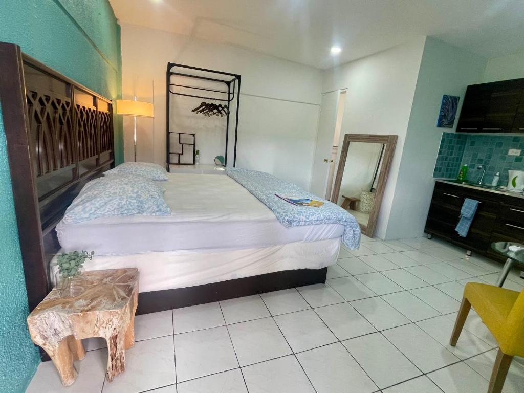 Postel nebo postele na pokoji v ubytování Palm Beach 248